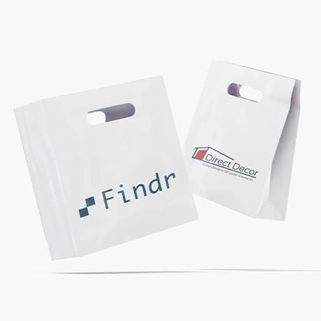 Tassen met uitgestanste handgreep