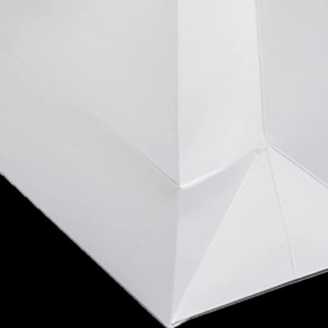 Tassen met uitgestanste handgreep